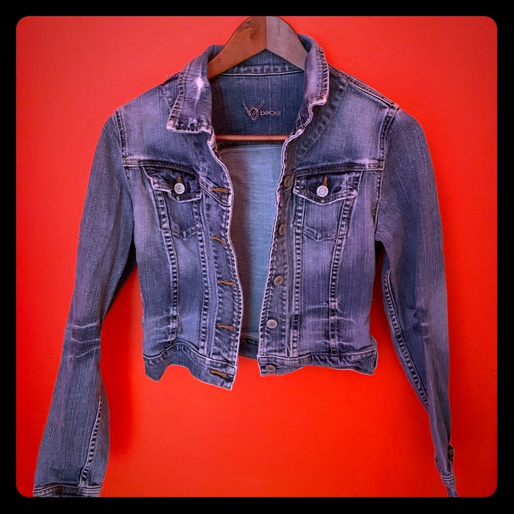 Bebe rhinestone logo distressed jean jacket